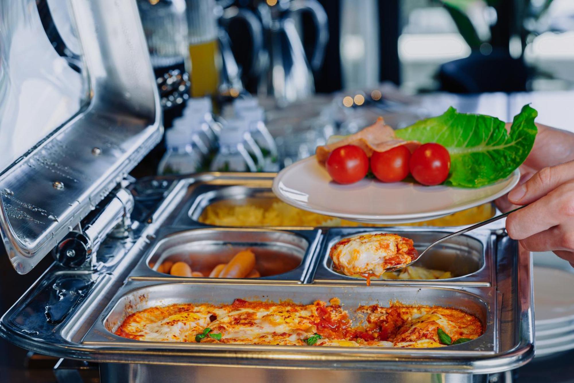 Tapis Rouge Design Boutique Hotel 巴统 外观 照片 A chafing dish